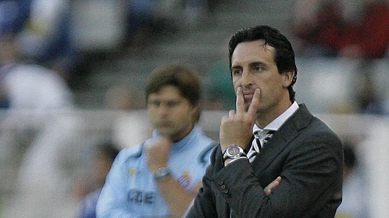 Unai Emery watches on during his Valencia team's defeat to Mauricio Pochettino's Espanyol in May 2009