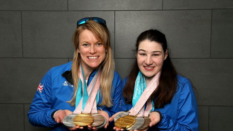 Jen Kehoe and Menna Fitzpatrick (R) showcasing their medals from the PyeongChang 2018 Paralympic Winter Games