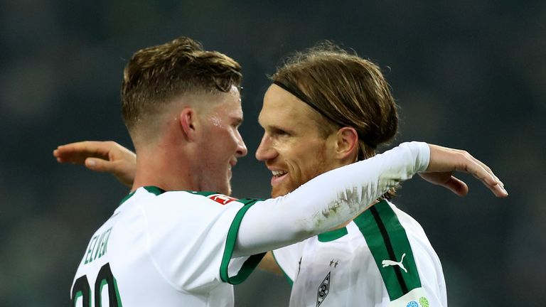 Michael Lang (R) celebrates with team-mate Thorgan Hazard after Borussia Moenchengladbach's win