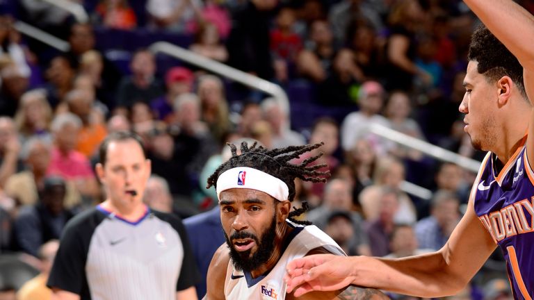 Mike Conley of the Memphis Grizzlies handles the ball against the Phoenix Suns