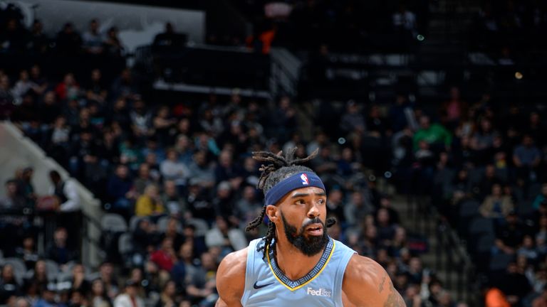SAN ANTONIO, TX - NOVEMBER 21: Mike Conley #11 of the Memphis Grizzlies handles the ball against the San Antonio Spurs on November 21, 2018 at the AT&T Center in San Antonio, Texas. NOTE TO USER: User expressly acknowledges and agrees that, by downloading and/or using this photograph, user is consenting to the terms and conditions of the Getty Images License Agreement. Mandatory Copyright Notice: Copyright 2018 NBAE (Photos by Mark Sobhani/NBAE via Getty Images)