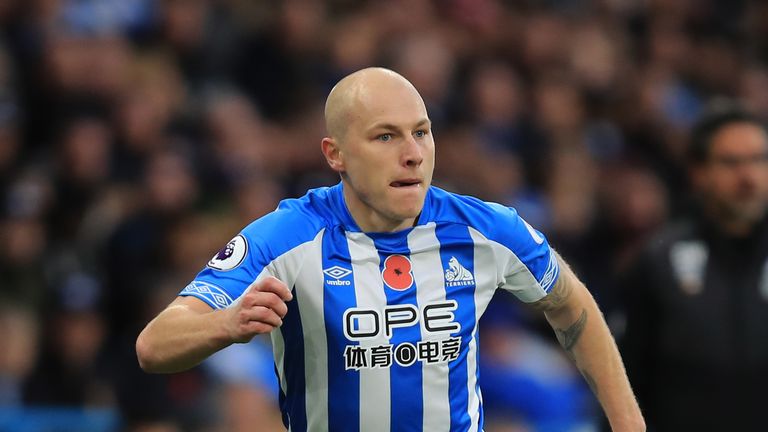 Aaron Mooy runs with the ball during Huddersfield's draw with West Ham.