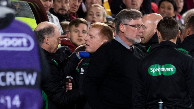 Neil Lennon was struck by a coin in Hibernian's 0-0 draw with Hearts in the Edinburgh derby
