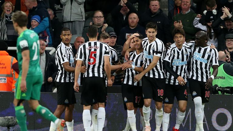 Newcastle players celebrate Ayoze Perez's winner against Watford