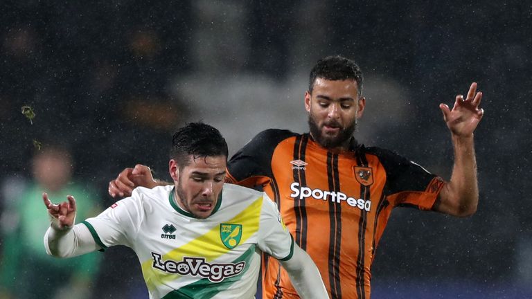Norwich City's Emi Buendia (left) and Hull City's Kevin Stewart battle for the ball during the Sky Bet Championship match at The KCOM Stadium, Hull. PRESS ASSOCIATION Photo. Picture date: Tuesday November 27, 2018. See PA story SOCCER Hull. Photo credit should read: Simon Cooper/PA Wire. RESTRICTIONS: EDITORIAL USE ONLY No use with unauthorised audio, video, data, fixture lists, club/league logos or "live" services. Online in-match use limited to 120 images, no video emulation. No use in betting, games or single club/league/player publications.