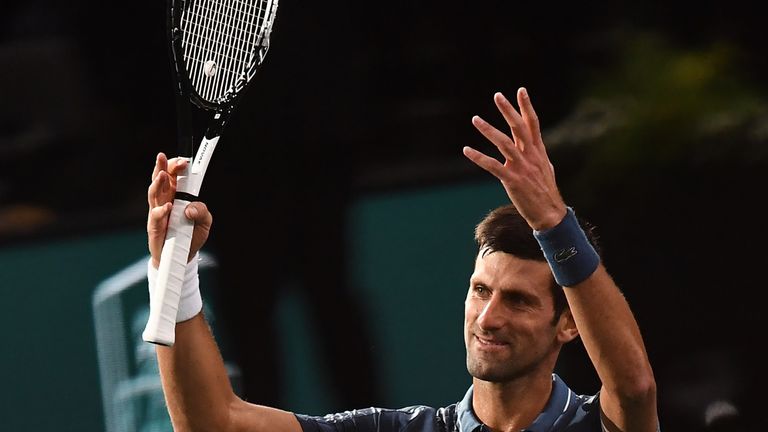 Novak Djokovic celebrates after winning his tennis match against Bosnia-Herzegovina's Damir Dzumhur, at the end of their men's singles third round tennis match on day four of the ATP World Tour Masters 1000 