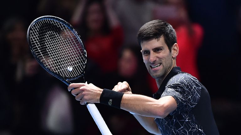 Novak Djokovic celebrates after winning against US player John Isner during their men's singles round-robin match on day two of the ATP World Tour Finals tennis tournament at the O2 Arena in London on November 12, 2018. 