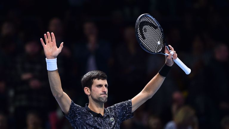 Novak Djokovic celebrates beating Germany&#39;s Alexander Zverev during their mens singles round-robin match on day four of the ATP World Tour Finals tennis tournament at the O2 Arena in London on November 14, 2018. 
