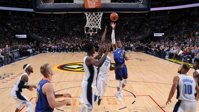 Monte Morris #11 of the Denver Nuggets shoots the ball against the Orlando Magic on November 23, 2018 at the Pepsi Center in Denver, Colorado.