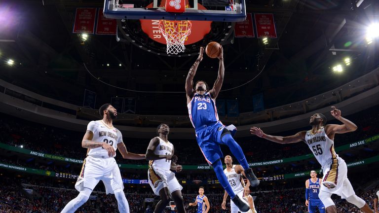 Jimmy Butler #23 of the Philadelphia 76ers goes to the basket against the New Orleans Pelicans on November 21, 2018 at Wells Fargo Center in Philadelphia, Pennsylvania.