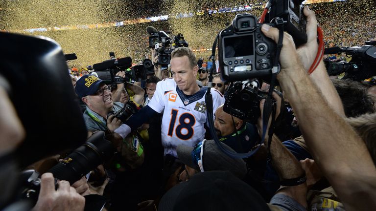 Quarterback Petyton Manning of the Denver Broncos is surrounded by the media following victory over the Carolina Panthers in Super Bowl 50 at Levi's Stadium in Santa Clara, California February 7, 2016.