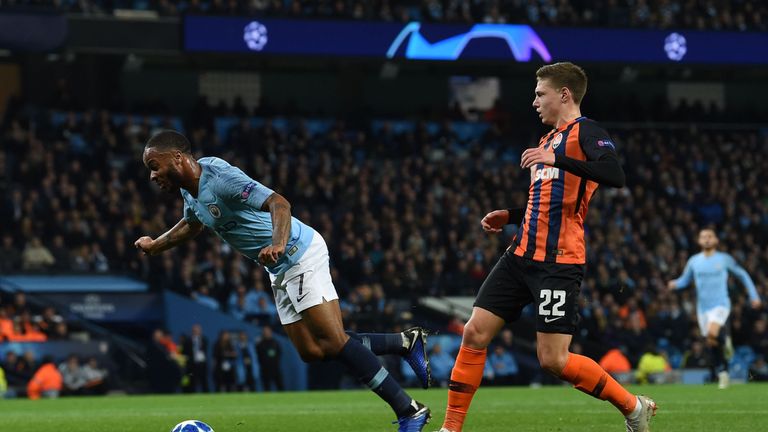 Raheem Sterling kicks the turf before going down in the penalty area