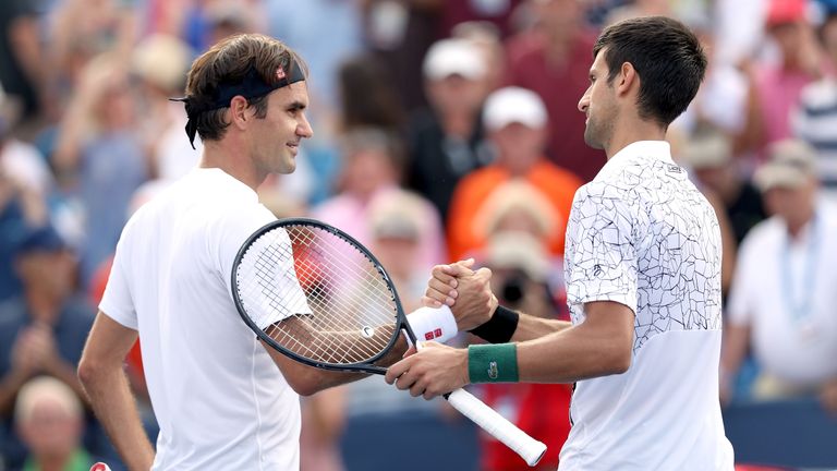 Roger Federer of Switzerland congratulates Novak Djokovic of Serbia after their match during the men&#39;s final of the Western & Southern Open at Lindner Family Tennis Center on August 19, 2018 in Mason, Ohio