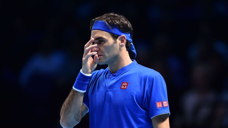 Roger Federer reacts after losing a point to Japan&#39;s Kei Nishikori during their singles round robin match on day one of the ATP World Tour Finals tennis tournament at the O2 Arena in London on November 11, 2018.
