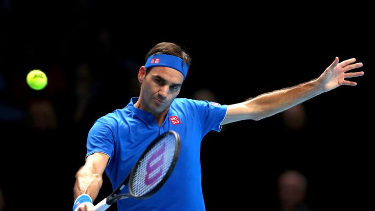 Roger Federer of Switzerland plays a backhand during his singles round robin match against Dominic Thiem of Austria during Day Three of the Nitto ATP World Tour Finals at The O2 Arena on November 13, 2018 in London, England