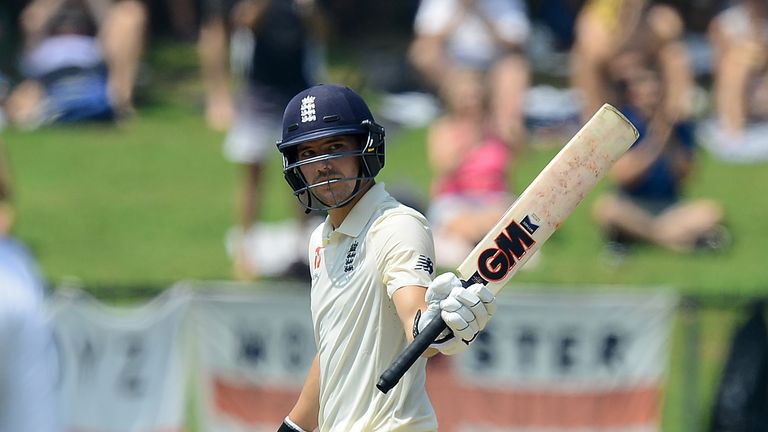 Rory Burns raises his bat after scoring his maiden Test fifty for England