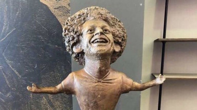 The statue features Mo Salah with his arms outstretched