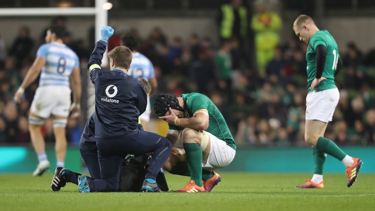 Sean O'Brien reacts after fracturing his forearm against Argentina