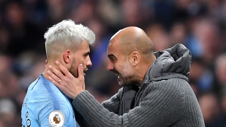 Sergio Aguero is embraced by Pep Guardiola following his substitution