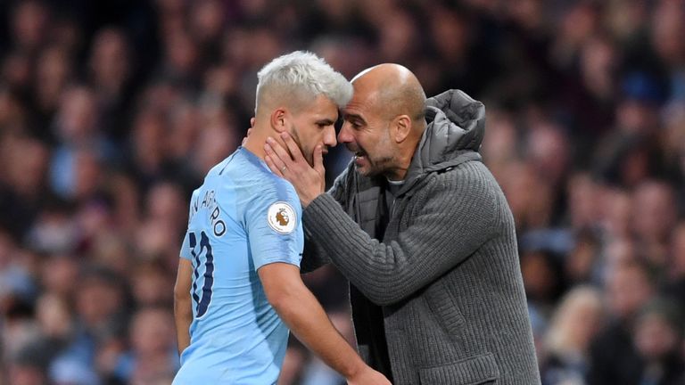 Sergio Aguero is embraced by Pep Guardiola following his substitution