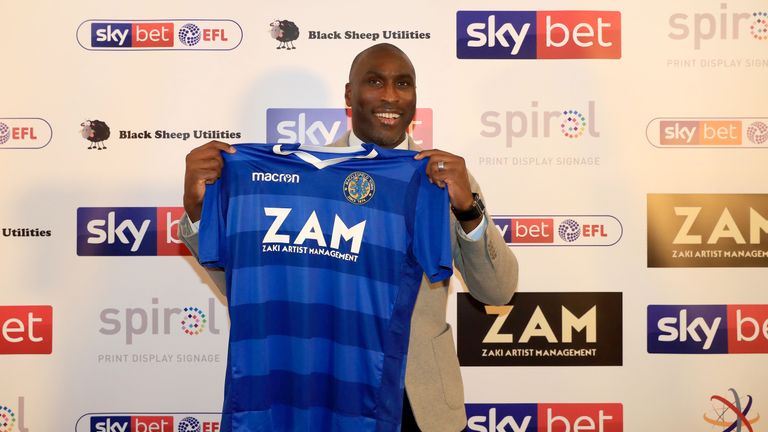 New Macclesfield Town manager Sol Campbell poses for a photo after his press conference at Moss Rose