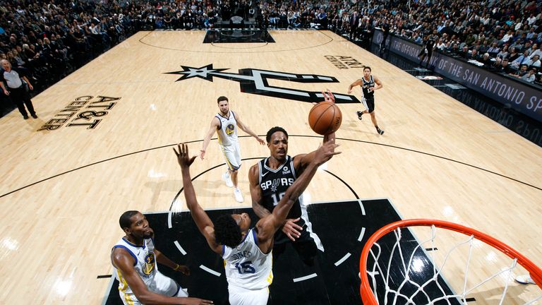 DeMar DeRozan #10 of the San Antonio Spurs shoots the ball against the Golden State Warriors on November 18, 2018 at the AT&T Center in San Antonio, Texas.