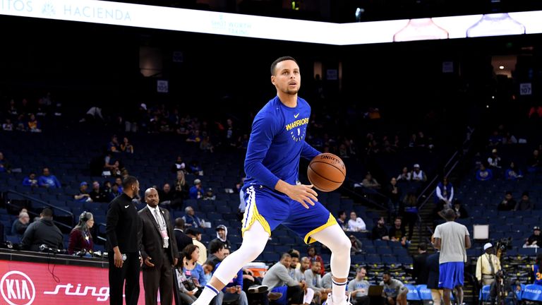 Stephen Curry of the Golden State Warriors warms up
