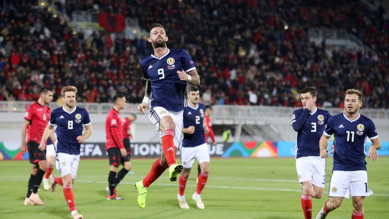 Scotland's Steven Fletcher (centre) celebrates scoring his side's second goal of the game from a penalty during the UEFA Nations League, Group C1 match