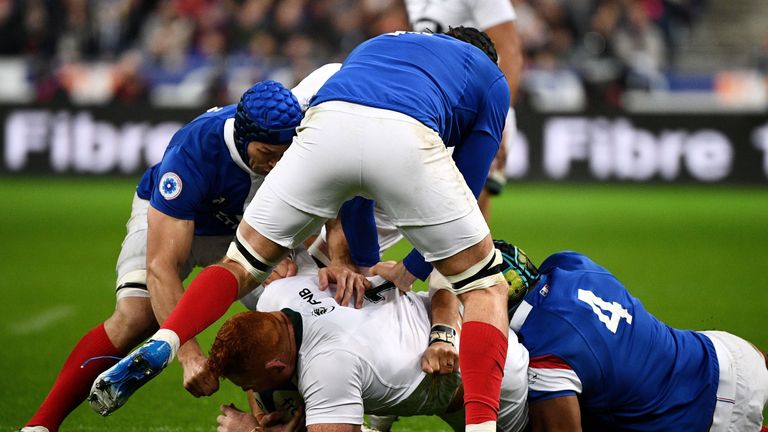 South Africa's prop Steven Kitshoff (C) is is tackled by France's lock Sebastien Vahaamahina (R) during the international rugby union test match between France and South Africa at the Stade de France in Saint-Denis, north of Paris, on November 10, 2018. 