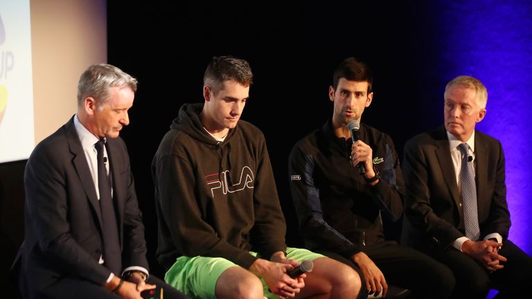 Novak Djokovic sits alongside ATP executive chairman and president Chris Kemode (left), John Isner and far right Craig Tiley CEO of Tennis Australia