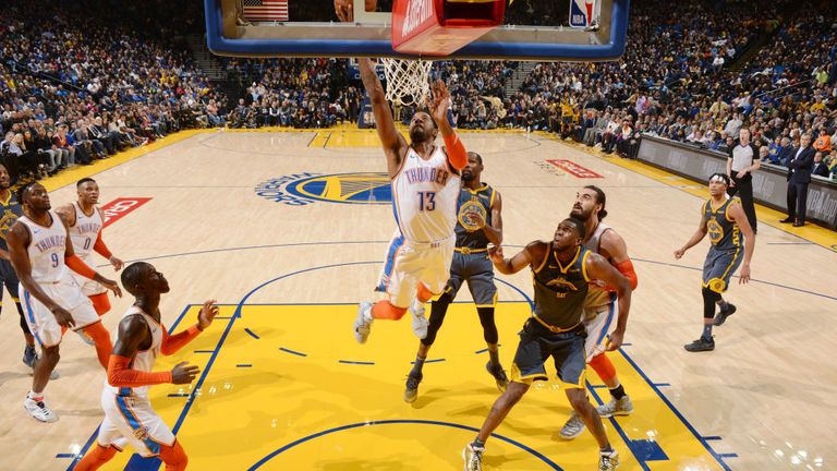  Paul George #13 of the Oklahoma City Thunder drives to the basket during the game against the Golden State Warriors on November 21, 2018 at ORACLE Arena in Oakland, California.