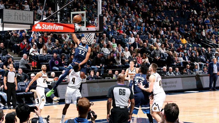  Karl-Anthony Towns #32 of the Minnesota Timberwolves shoots the ball against the Denver Nuggets on November 21, 2018 at Target Center in Minneapolis, Minnesota.