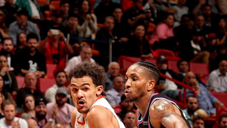 Trae Young #11 of the Atlanta Hawks handles the ball against the Miami Heat on November 27, 2018 at American Airlines Arena in Miami, Florida.