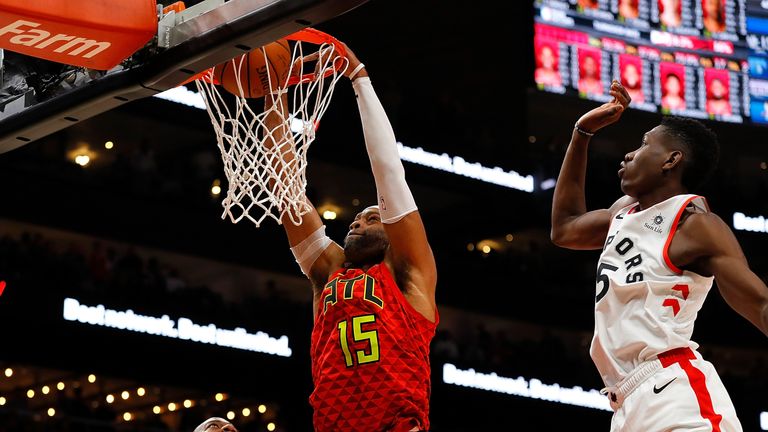 Vince Carter #15 of the Atlanta Hawks dunks and scores his 25,000th NBA point in the final seconds of their 124-108 loss to the Toronto Raptors at State Farm Arena on November 21, 2018 in Atlanta, Georgia. 