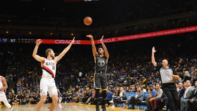 Quinn Cook #4 of the Golden State Warriors shoots the ball against the Portland Trail Blazers on November 23, 2018 at ORACLE Arena in Oakland, California.