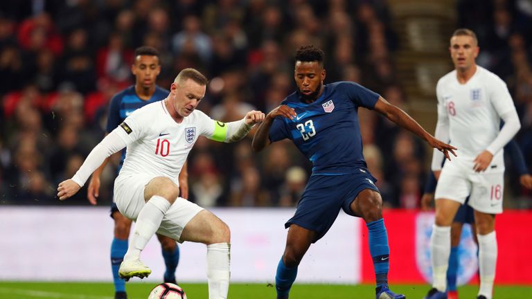 LONDON, ENGLAND - NOVEMBER 15: Wayne Rooney of England competes with Kellyn Acosta of USA during the International Friendly match between England and United States at Wembley Stadium on November 15, 2018 in London, United Kingdom. (Photo by Catherine Ivill/Getty Images) *** Local Caption *** Wayne Rooney;Kellyn Acosta