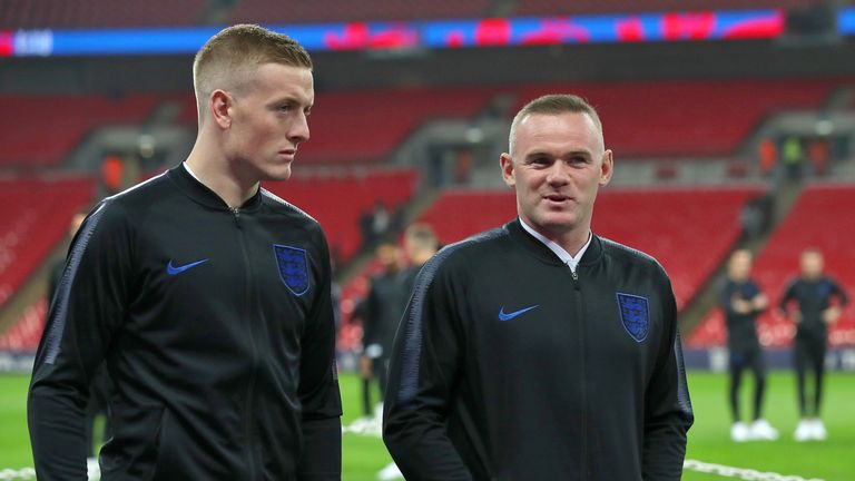 England's Wayne Rooney (right) speaks with Jordan Pickford before the International Friendly at Wembley Stadium, London