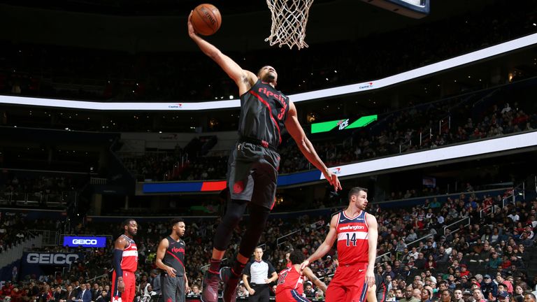 CJ McCollum #3 of the Portland Trail Blazers goes to the basket against the Washington Wizards on November 18, 2018 at Capital One Arena in Washington, DC. 