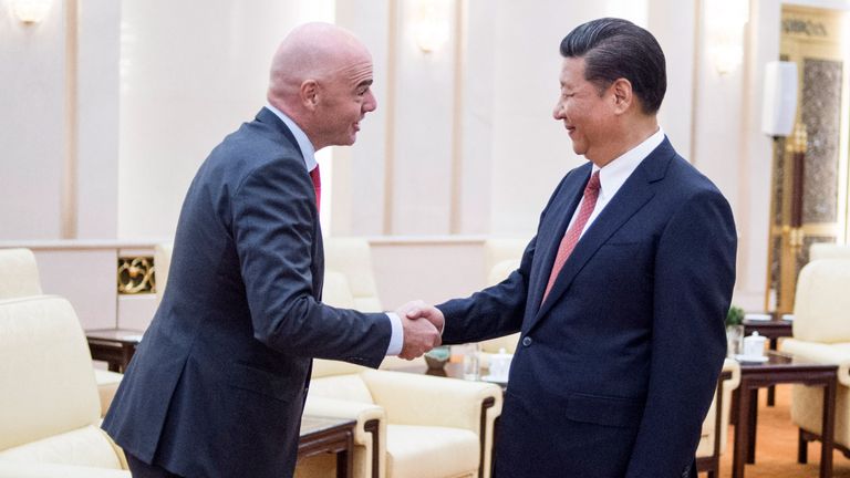 China's President Xi Jinping meets FIFA President Gianni Infantino at the Great Hall of the People in Beijing in 2017
