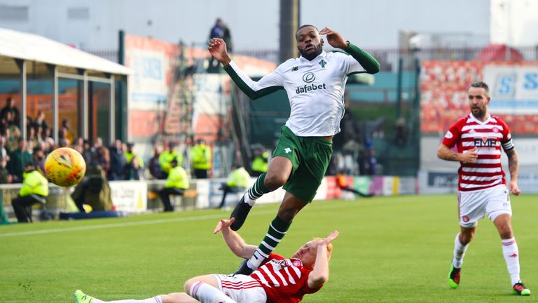 Hamilton's Ziggy Gordon slides in on Celtic midfielder Olivier Ntcham