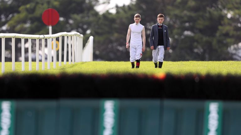 Jockey's Colin Keen and Evan Daly walk the course at Galway