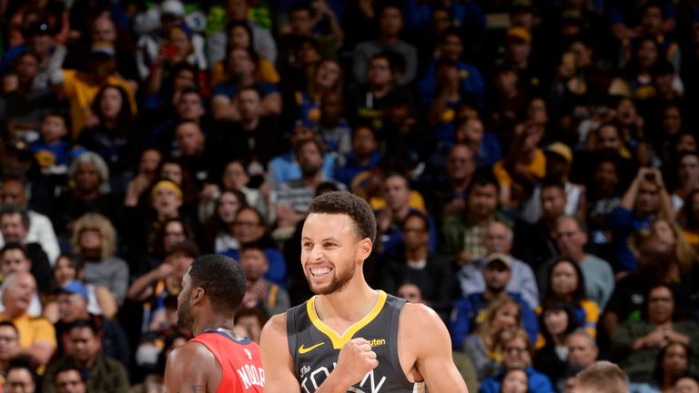 Stephen Curry celebrates as he leads the Golden State Warriors to a sixth straight win