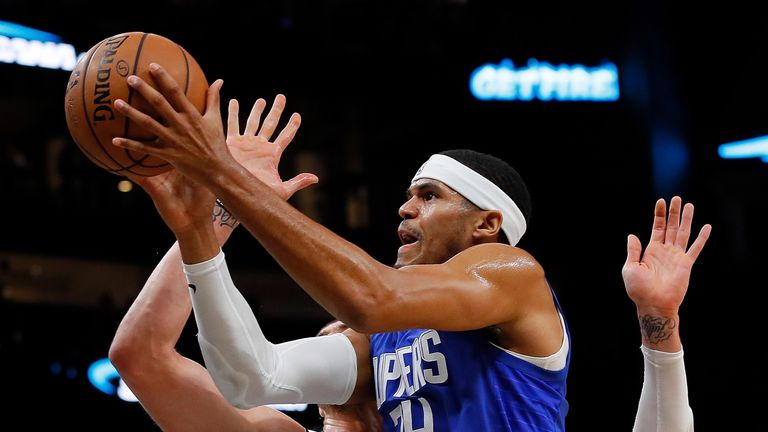 Tobias Harris attacks the basket against Atlanta