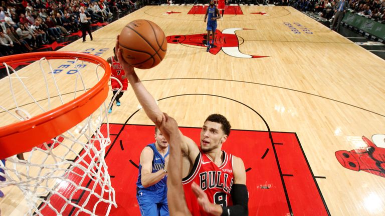 Zach LaVine scores against the Dallas Mavericks