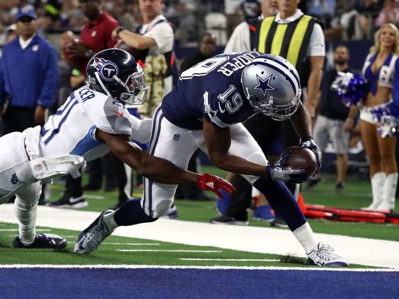 Amari Cooper scores in first game for Cowboys, but Titans defeat Dallas 