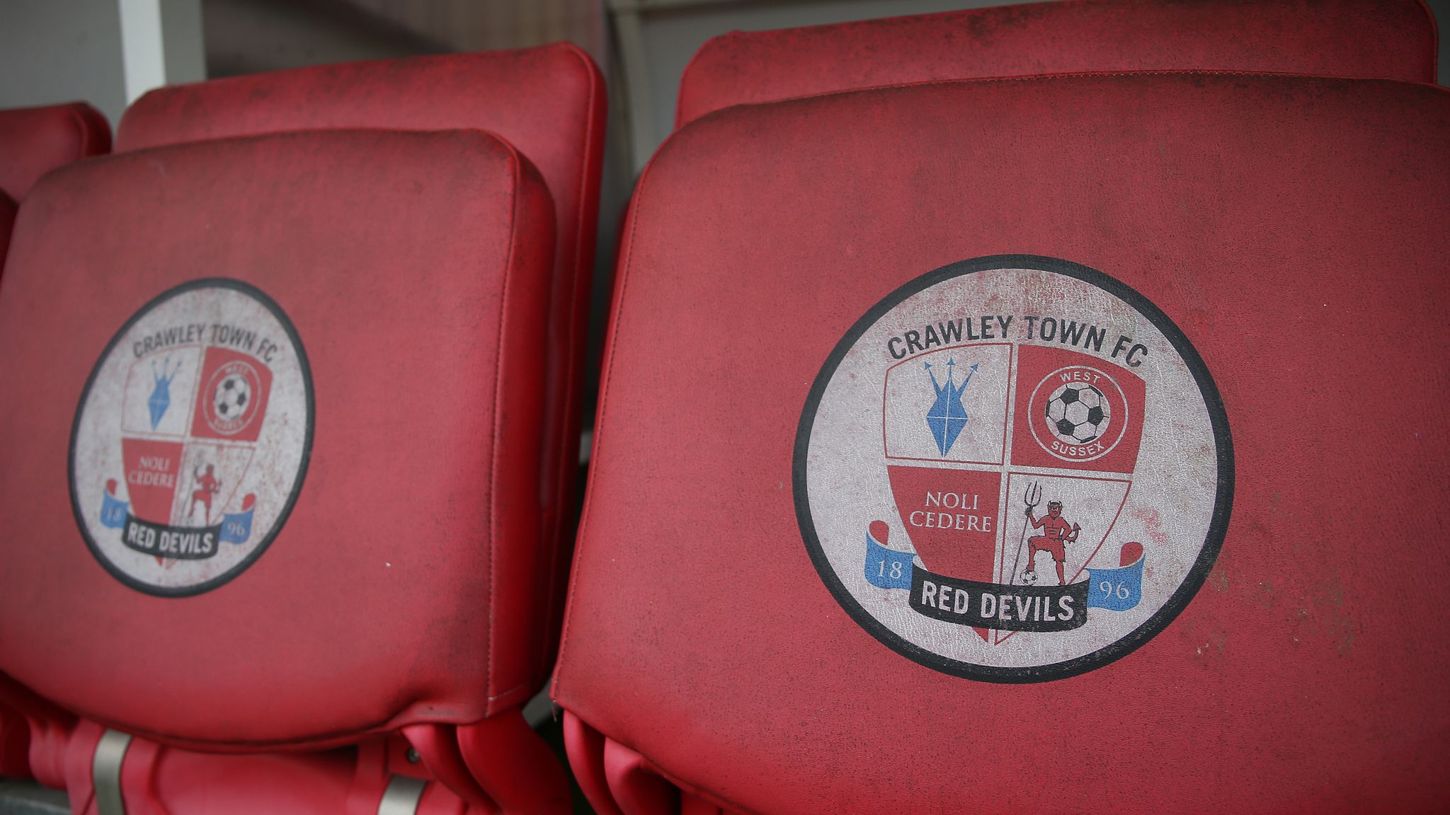Crawley face FA charge after assistant referee hit by bottle thrown