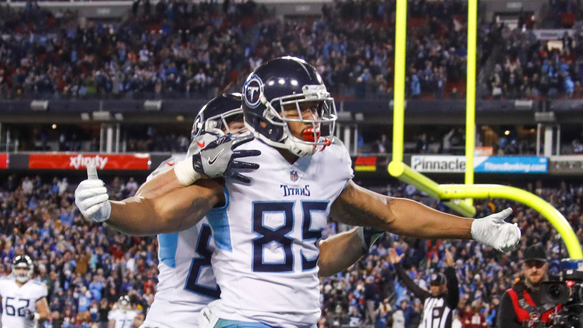 MyCole Pruitt of the Tennessee Titans runs on the field during the