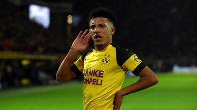 Jadon Sancho celebrates scoring for Dortmund
