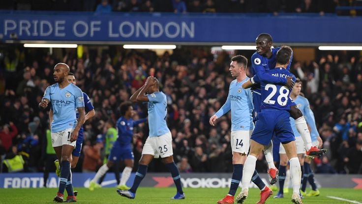 N'golo Kante of Chelsea celebrates after scoring his team's first goal with Cesar Azpilicueta of Chelsea during the Premier League match between Chelsea FC and Manchester City at Stamford Bridge on December 8, 2018 in London, United Kingdom