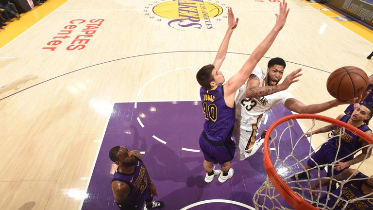 Anthony Davis attacks the rim against the Lakers